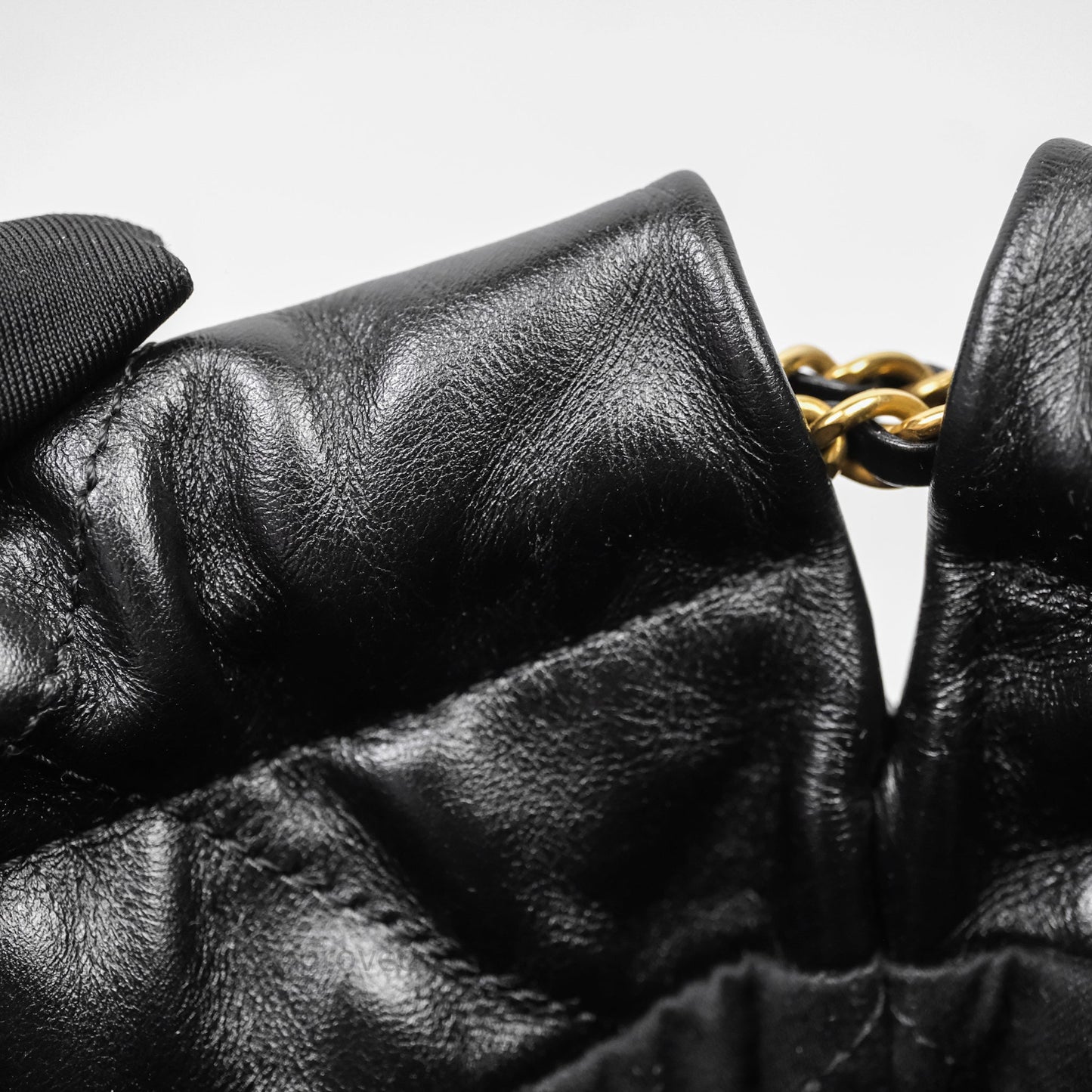 Chanel 22 Mini Bag Black Crumpled Calfskin White Lacquered Metal Logo