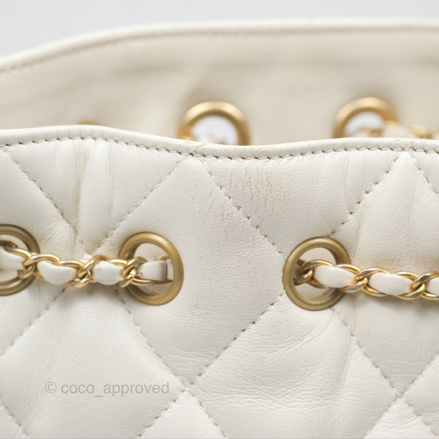 Chanel Quilted Drawstring Bucket Bag Ivory Lambskin Aged Gold Hardware