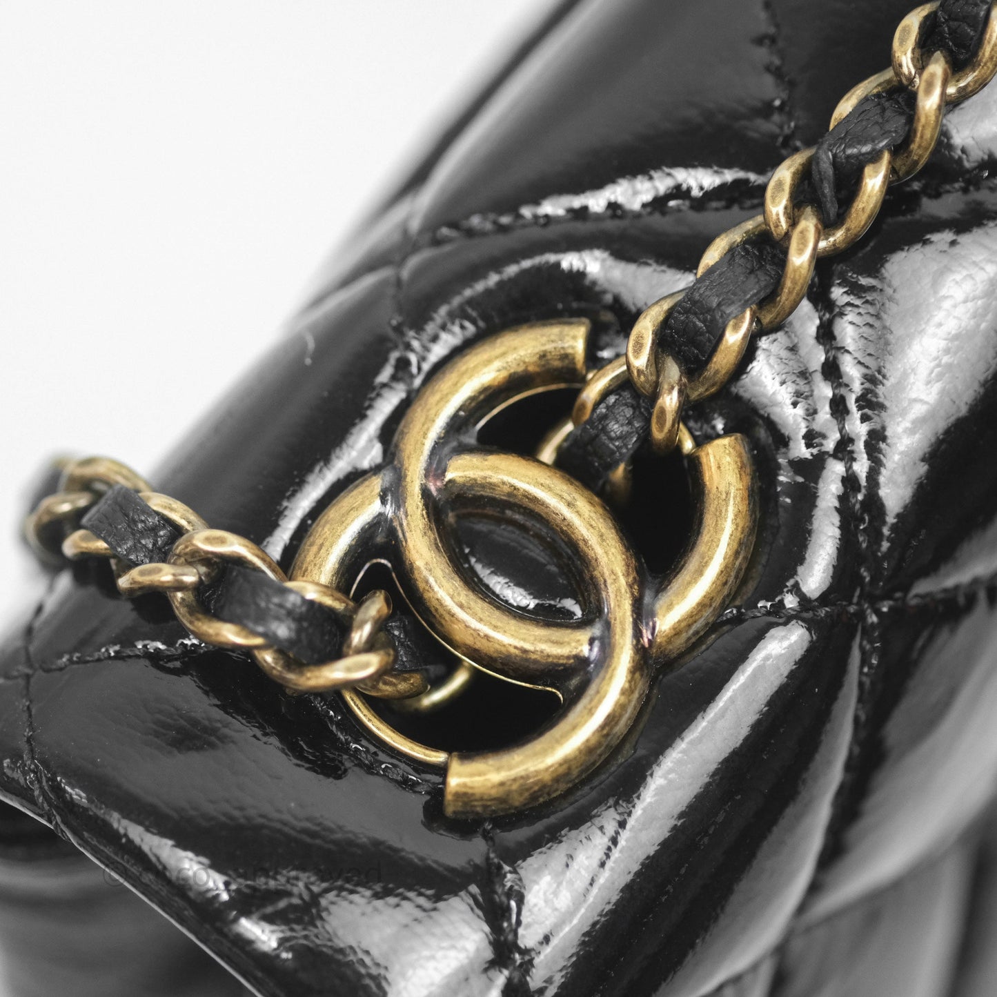 Chanel Quilted Medium Eyelet Flap Bag Black Patent Aged Gold Hardware