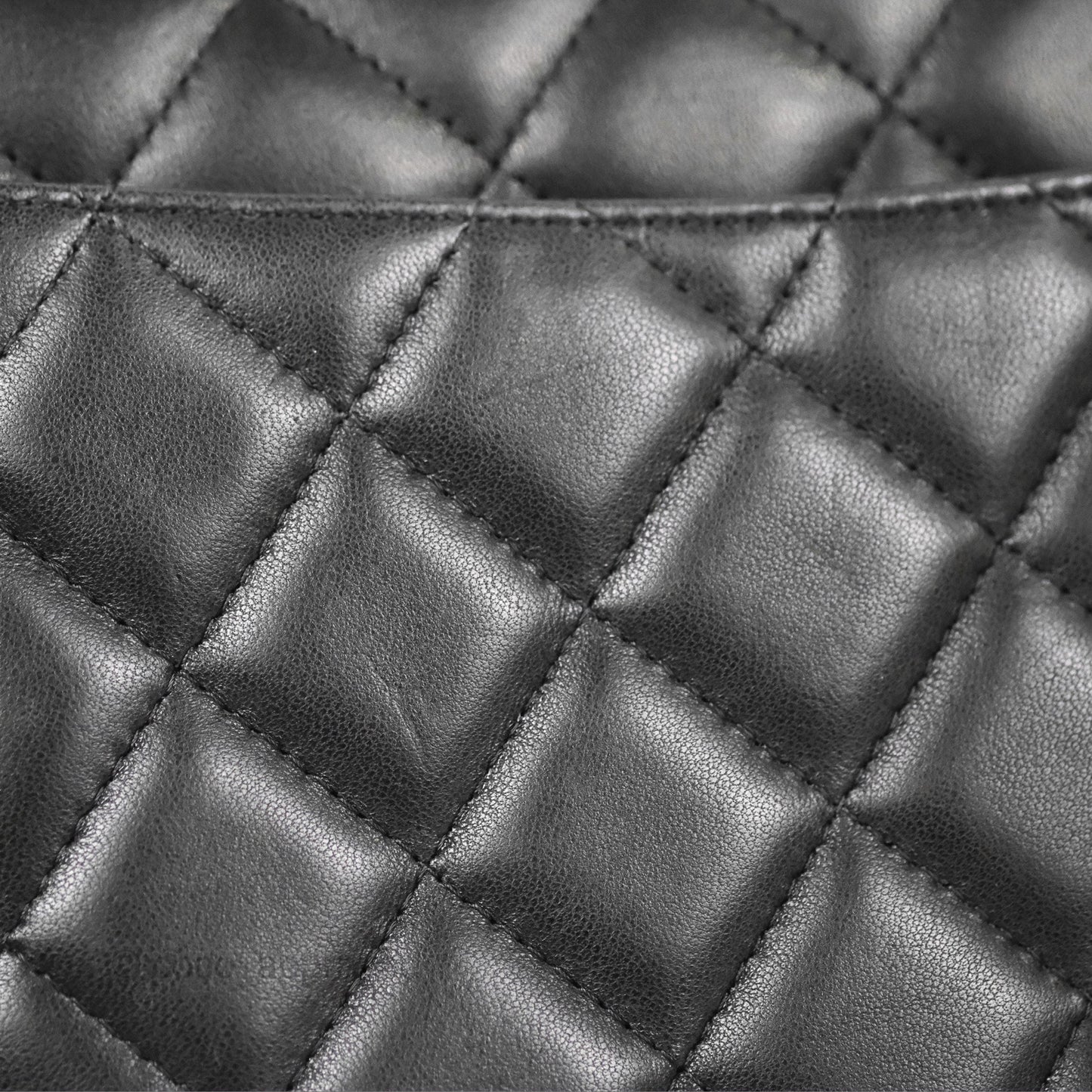 Chanel Quilted Maxi Double Flap Black Lambskin Silver Hardware