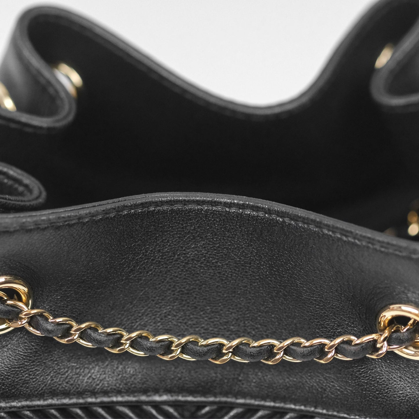 Chanel CC Chain Drawstring Bucket Bag Chevron Black Lambskin Gold Hardware