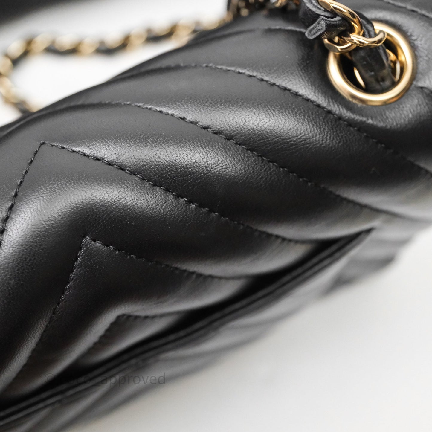 Chanel Quilted Mini Rectangular Chevron Black Lambskin Gold Hardware