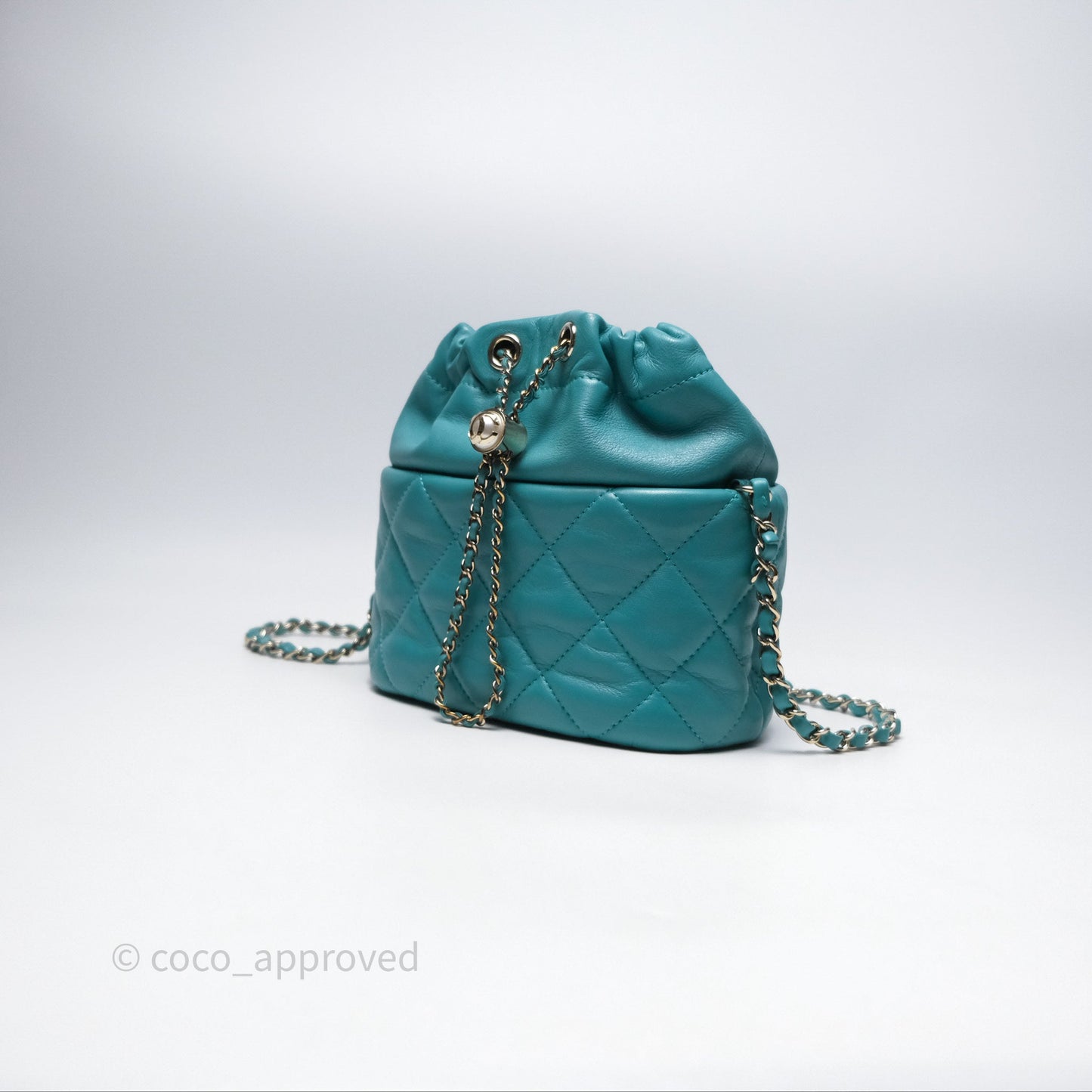 Chanel Pearl CC Drawstring Bucket Bag Teal Green Lambskin Gold Hardware