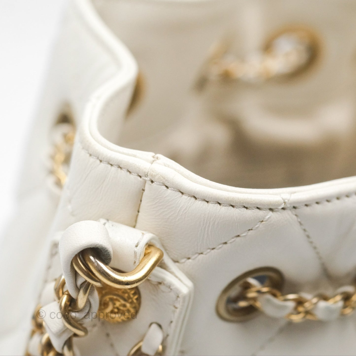 Chanel Quilted Drawstring Bucket Bag Ivory Lambskin Aged Gold Hardware