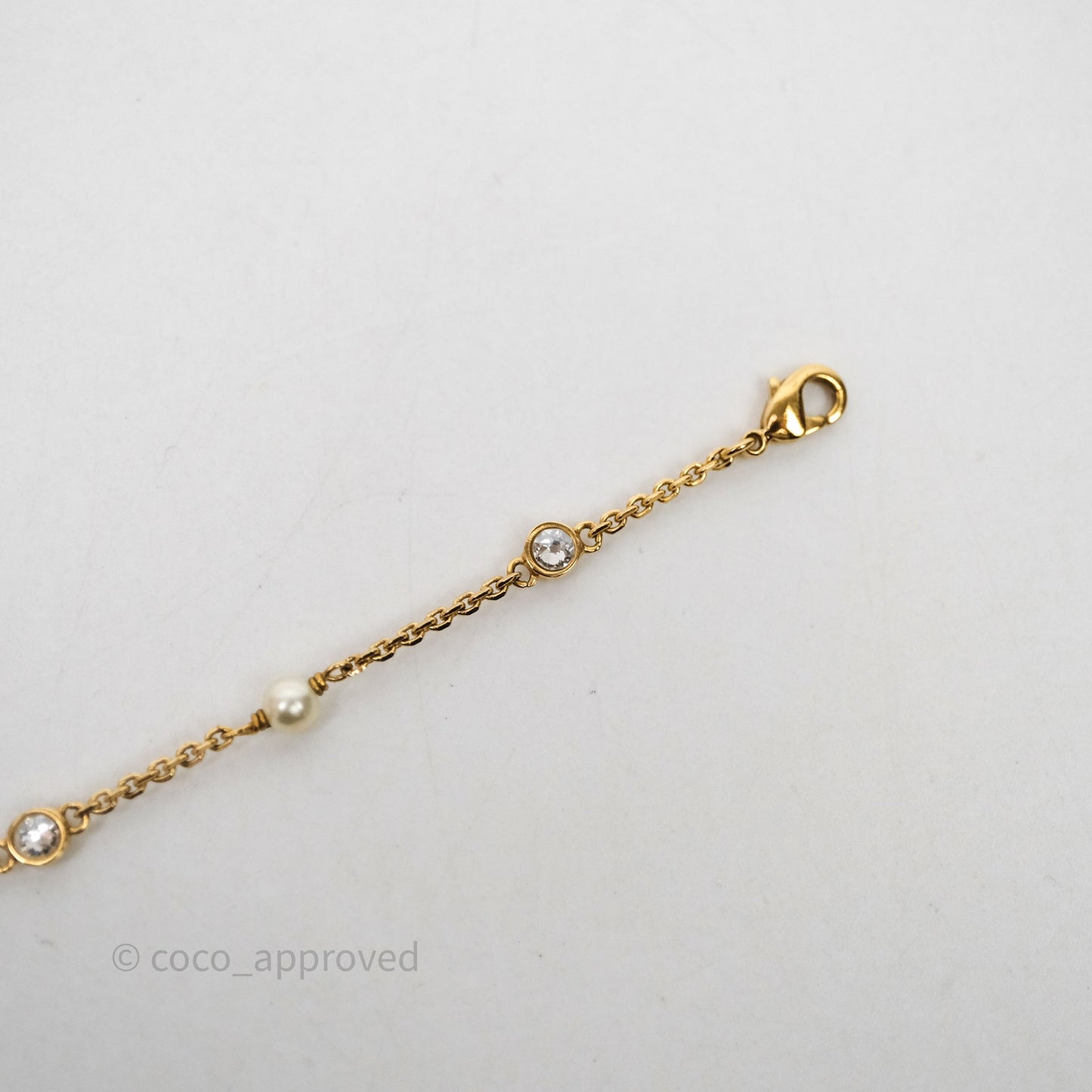 Christian Dior Metal Crystal Pearl CD Bracelet Gold Tone