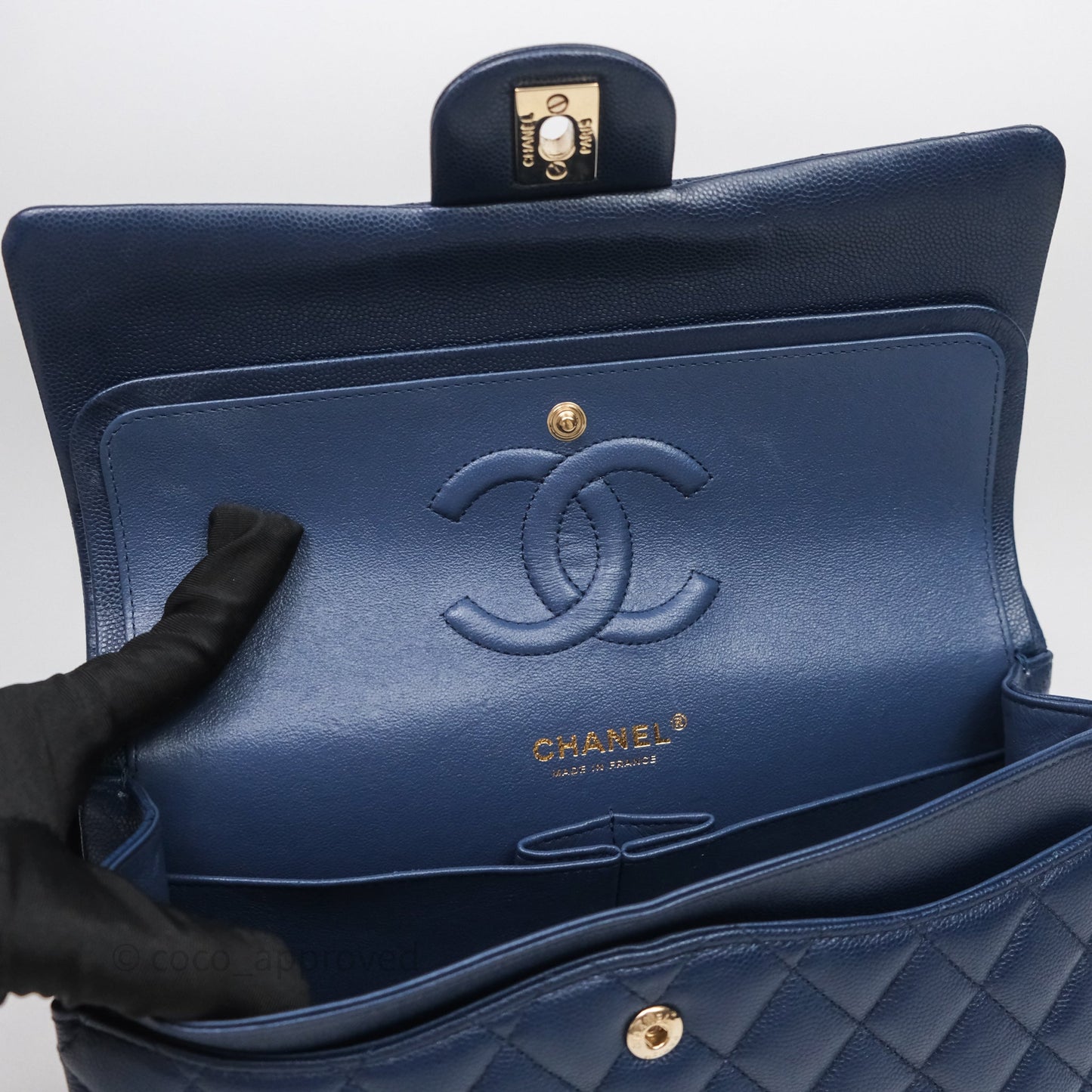Chanel Medium Classic Flap Quilted Dark Blue Caviar Gold Hardware