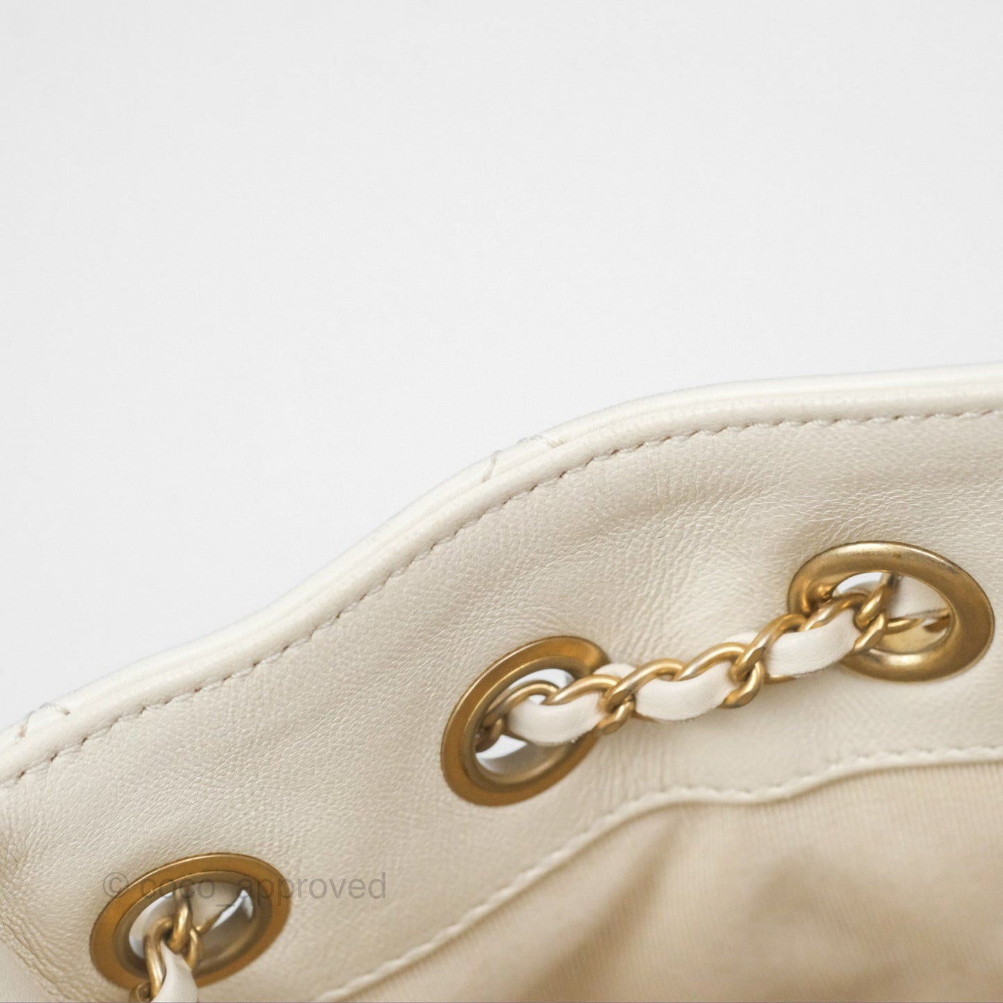Chanel Quilted Drawstring Bucket Bag Ivory Lambskin Aged Gold Hardware