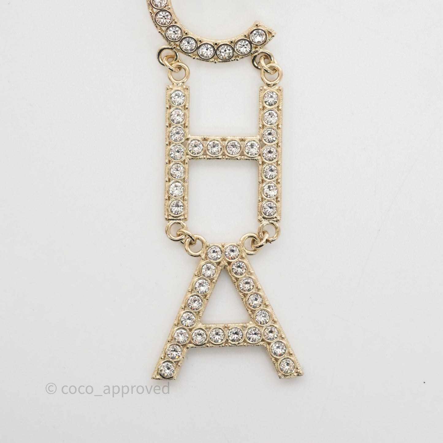 Chanel Crystal Cha-Nel Logo Drop Earrings Gold Tone 20V