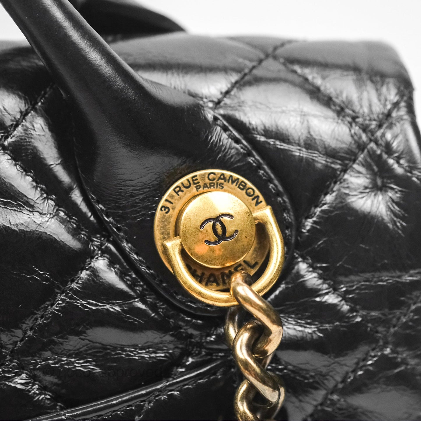 Chanel Medium Castle Rock Flap Black Glazed Calfskin Antique Gold Hardware