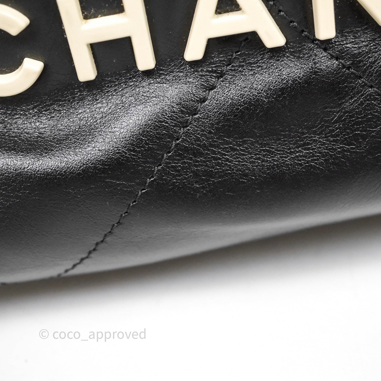 Chanel 22 Mini Bag Black Crumpled Calfskin White Lacquered Metal Logo