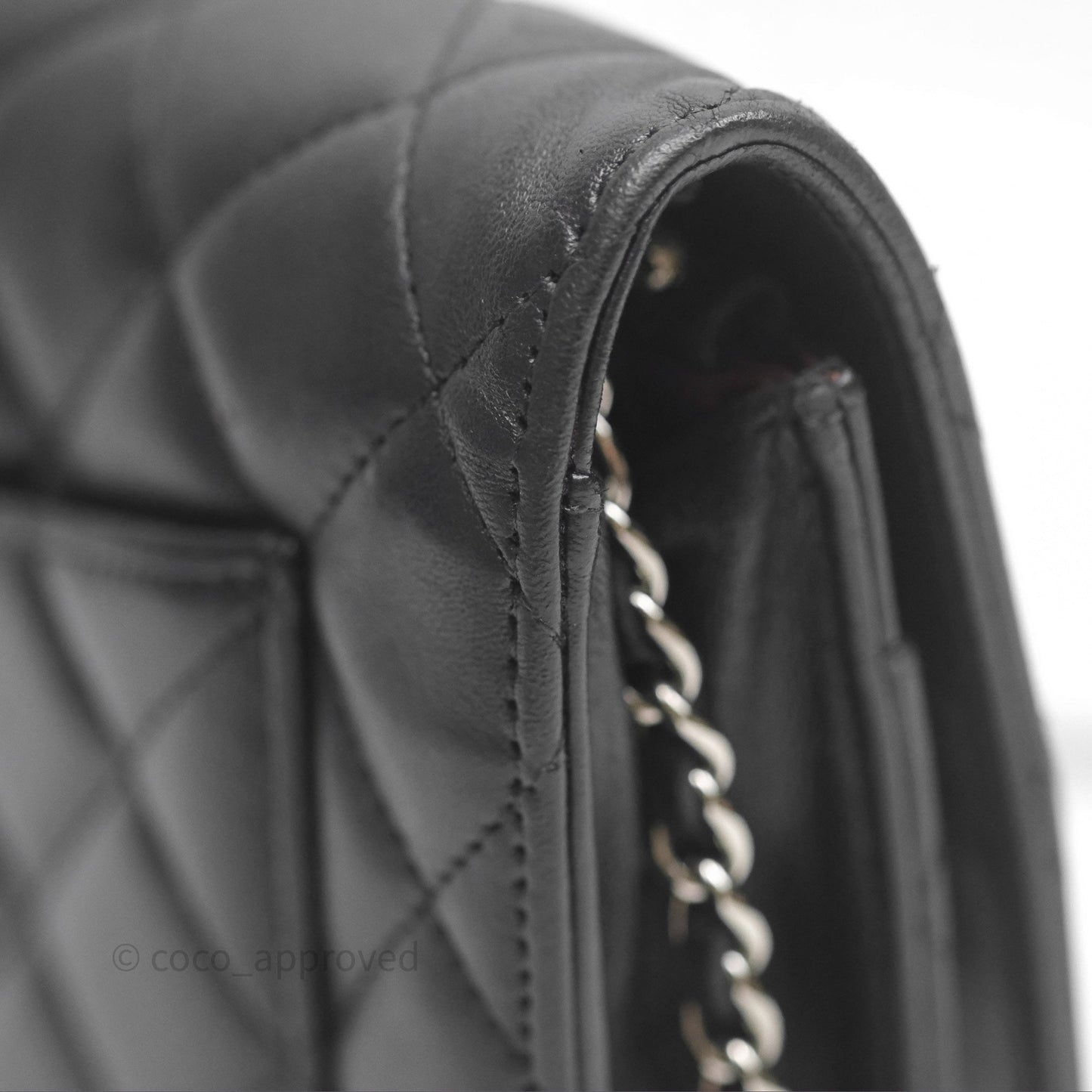 Chanel Quilted WOC Black Lambskin Silver Hardware