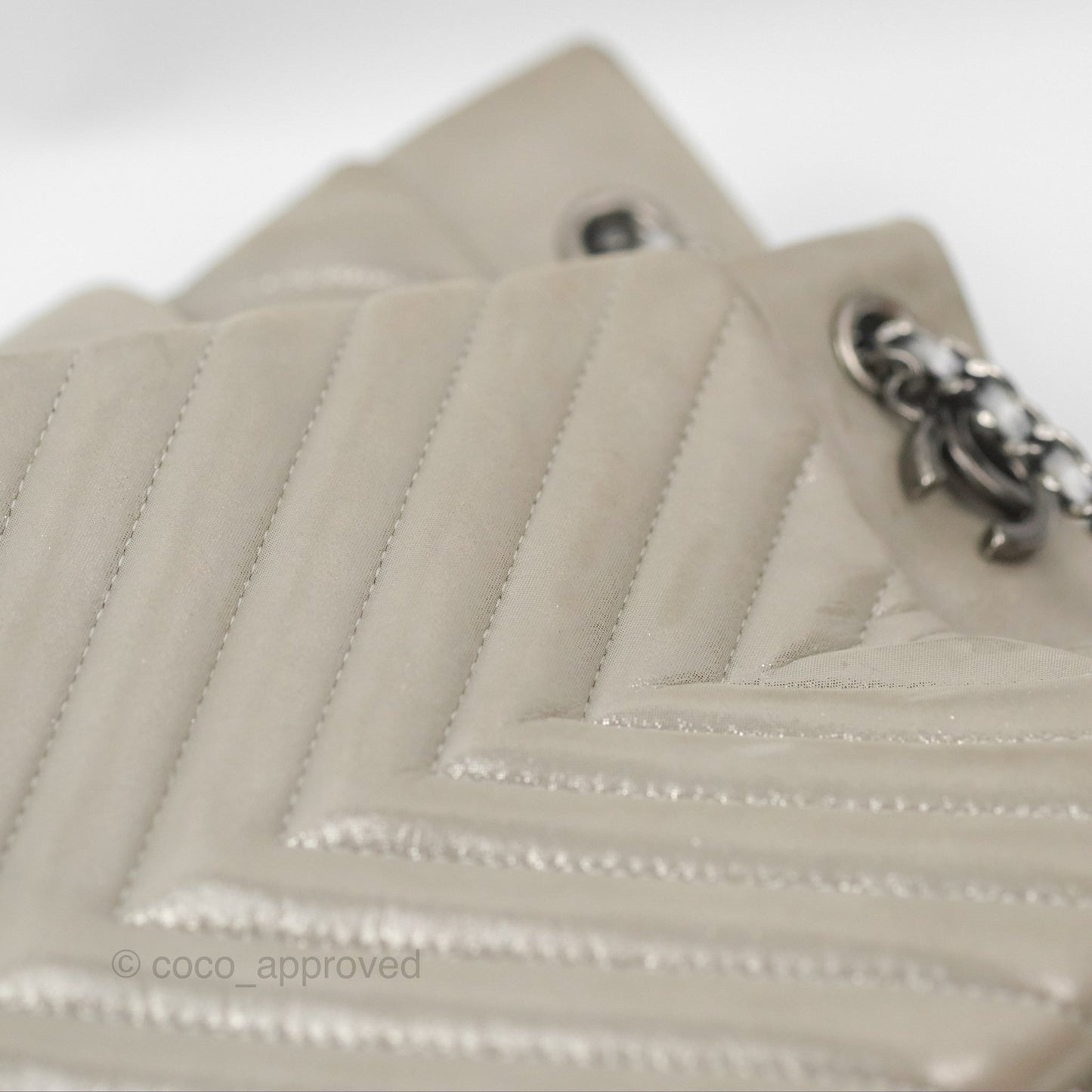 Chanel Small Urban Spirit Drawstring Bag Chevron Iridescent Silver Calfskin