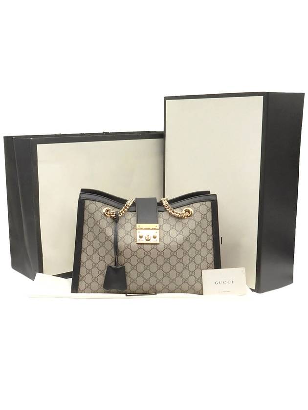 Luxury Gucci Trending 2025 GG Supreme Canvas Black Leather Paddle Lock Medium Shoulder Bag 479197