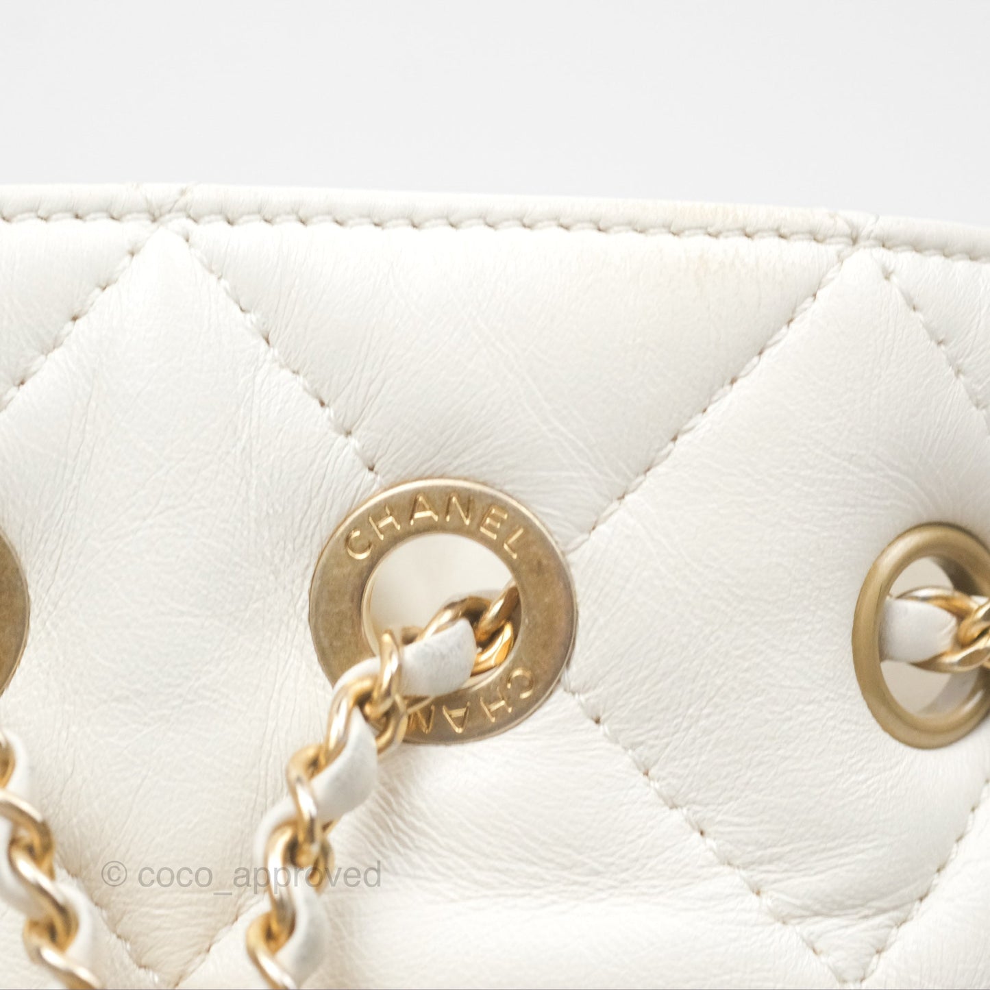 Chanel Quilted Drawstring Bucket Bag Ivory Lambskin Aged Gold Hardware