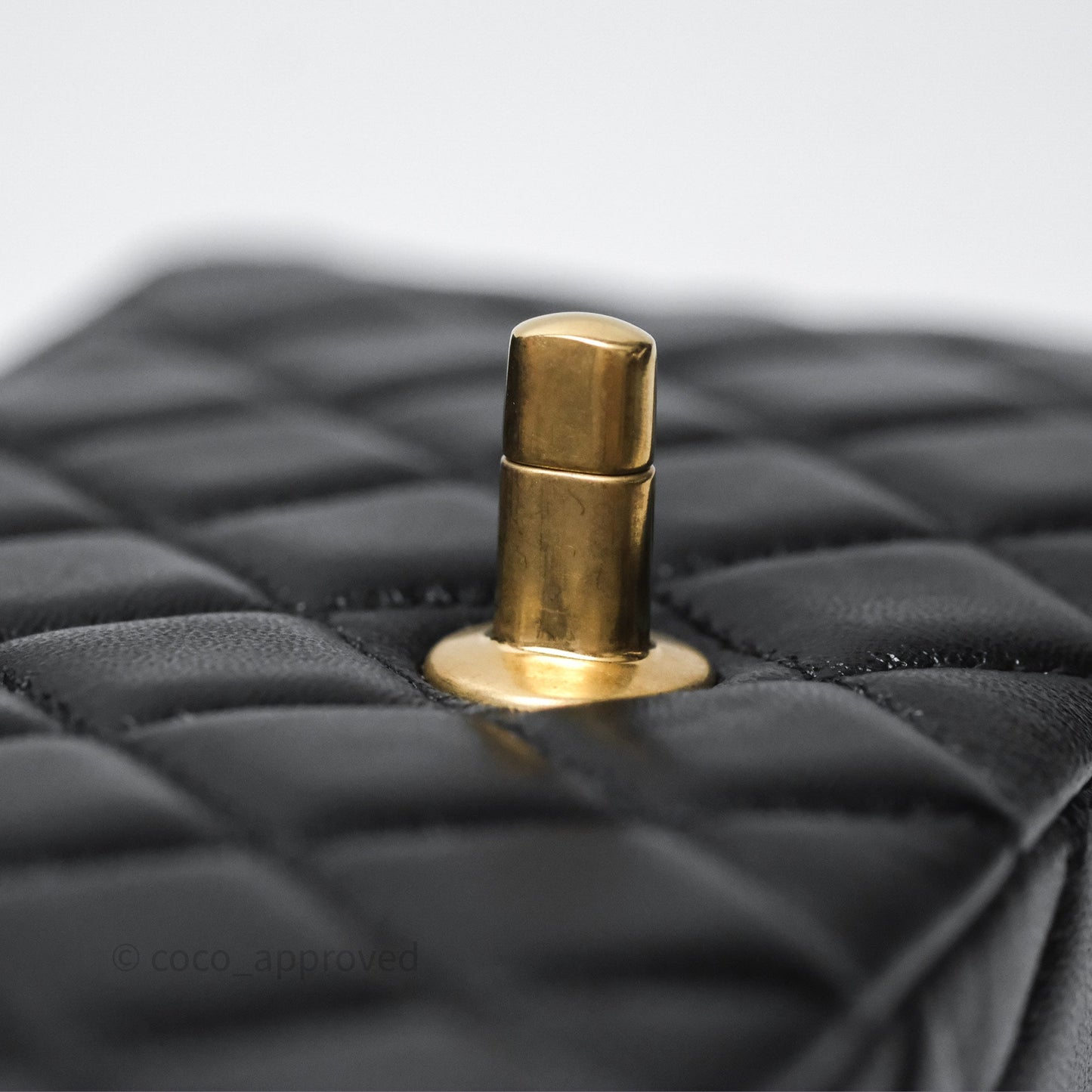 Chanel Flap Bag with Crystal Logo Top Handle Black Lambskin Aged Gold Hardware