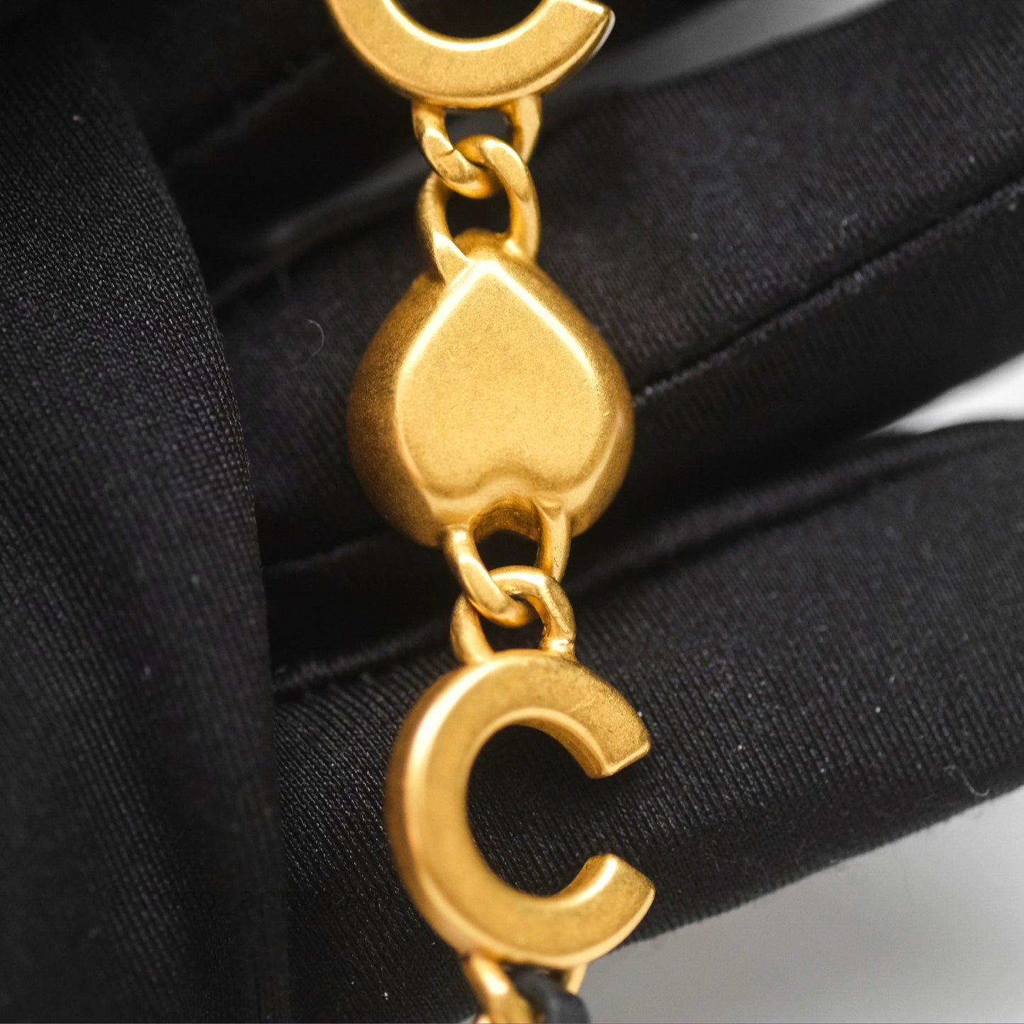 Chanel Vanity with COCO Heart Chain Black Lambskin Aged Gold Hardware