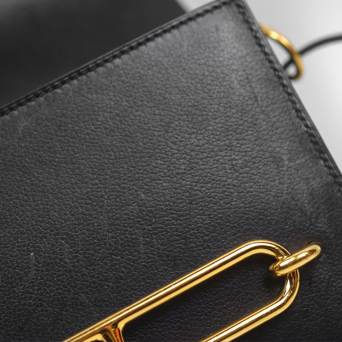 Hermès Roulis Mini 18 Noir 89 Veau Evergrain Gold Hardware