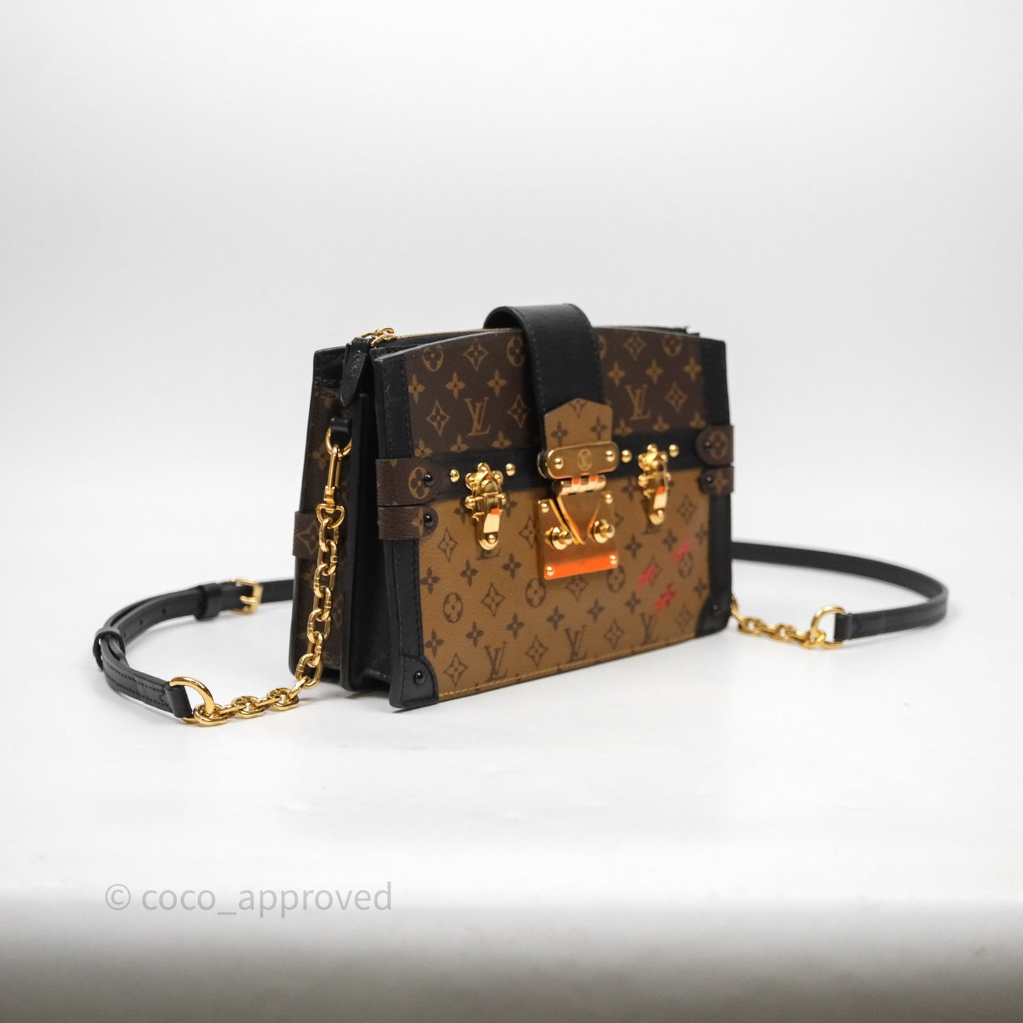 Louis Vuitton Monogram Reverse Trunk Clutch Bag