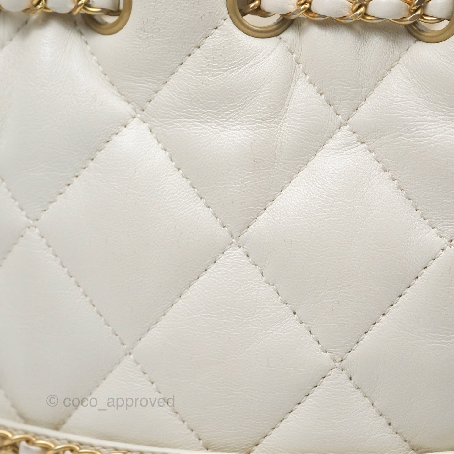Chanel Quilted Drawstring Bucket Bag Ivory Lambskin Aged Gold Hardware