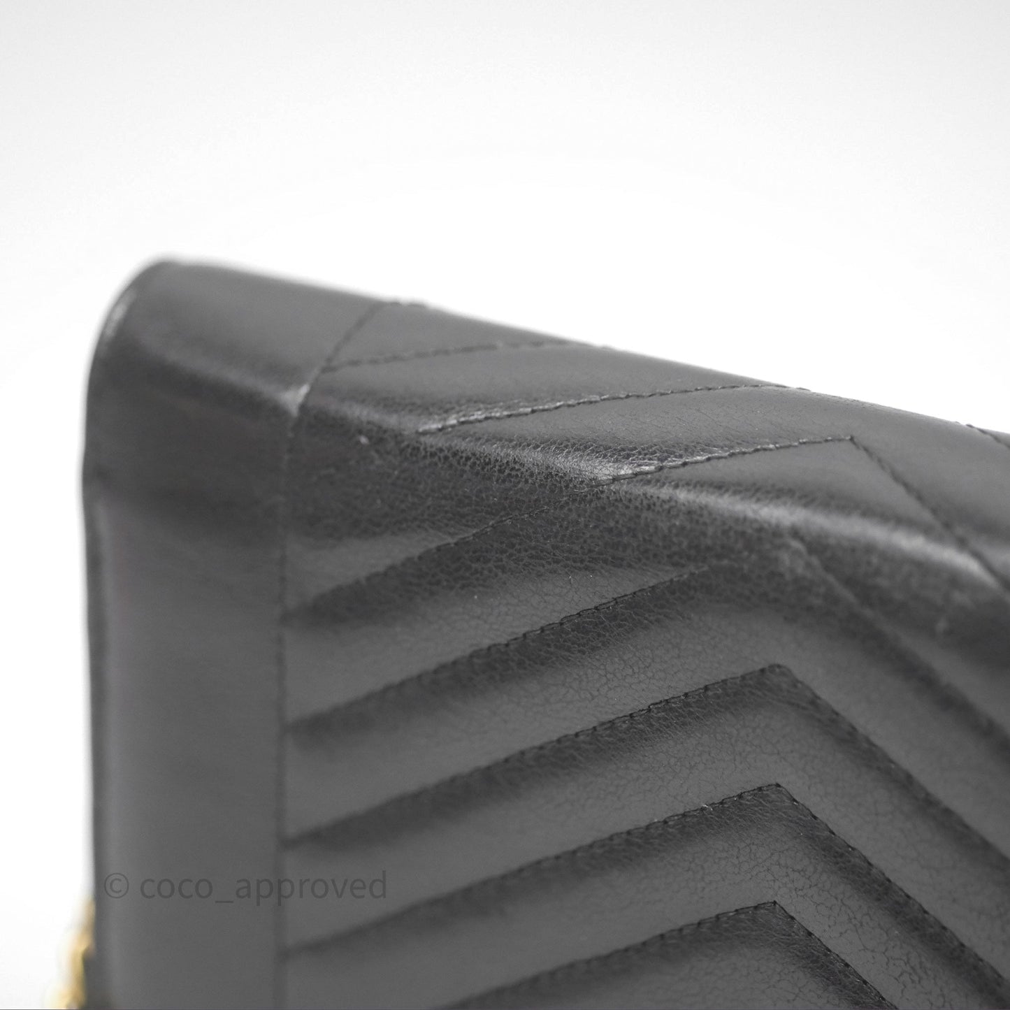 Chanel Reversed Chevron Wallet On Chain WOC Black Lambskin Aged Gold Hardware