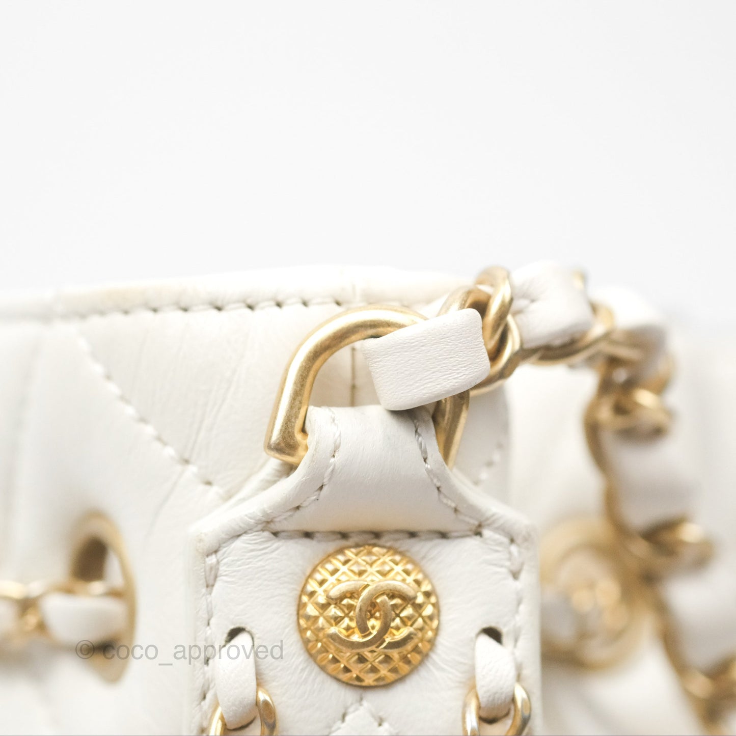Chanel Quilted Drawstring Bucket Bag Ivory Lambskin Aged Gold Hardware