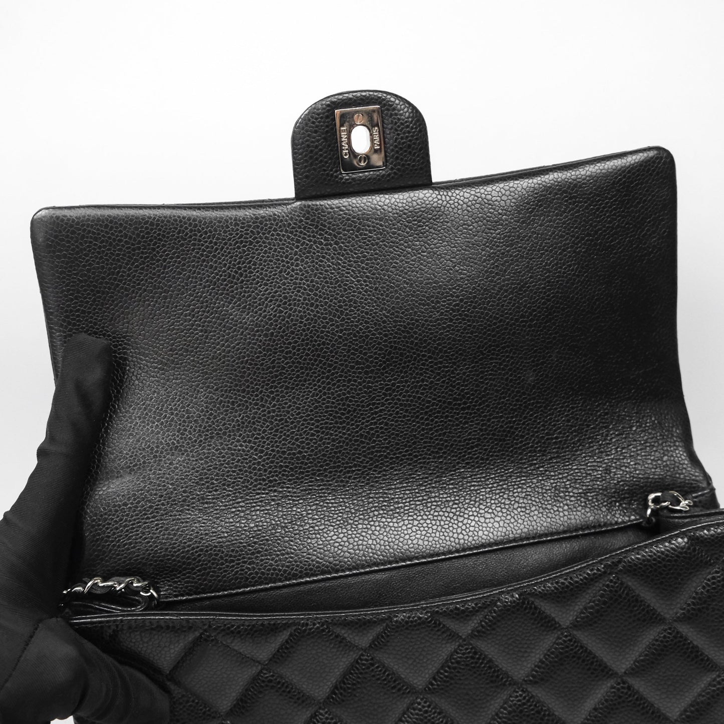 Chanel Quilted Clutch with Chain Black Caviar Silver Hardware