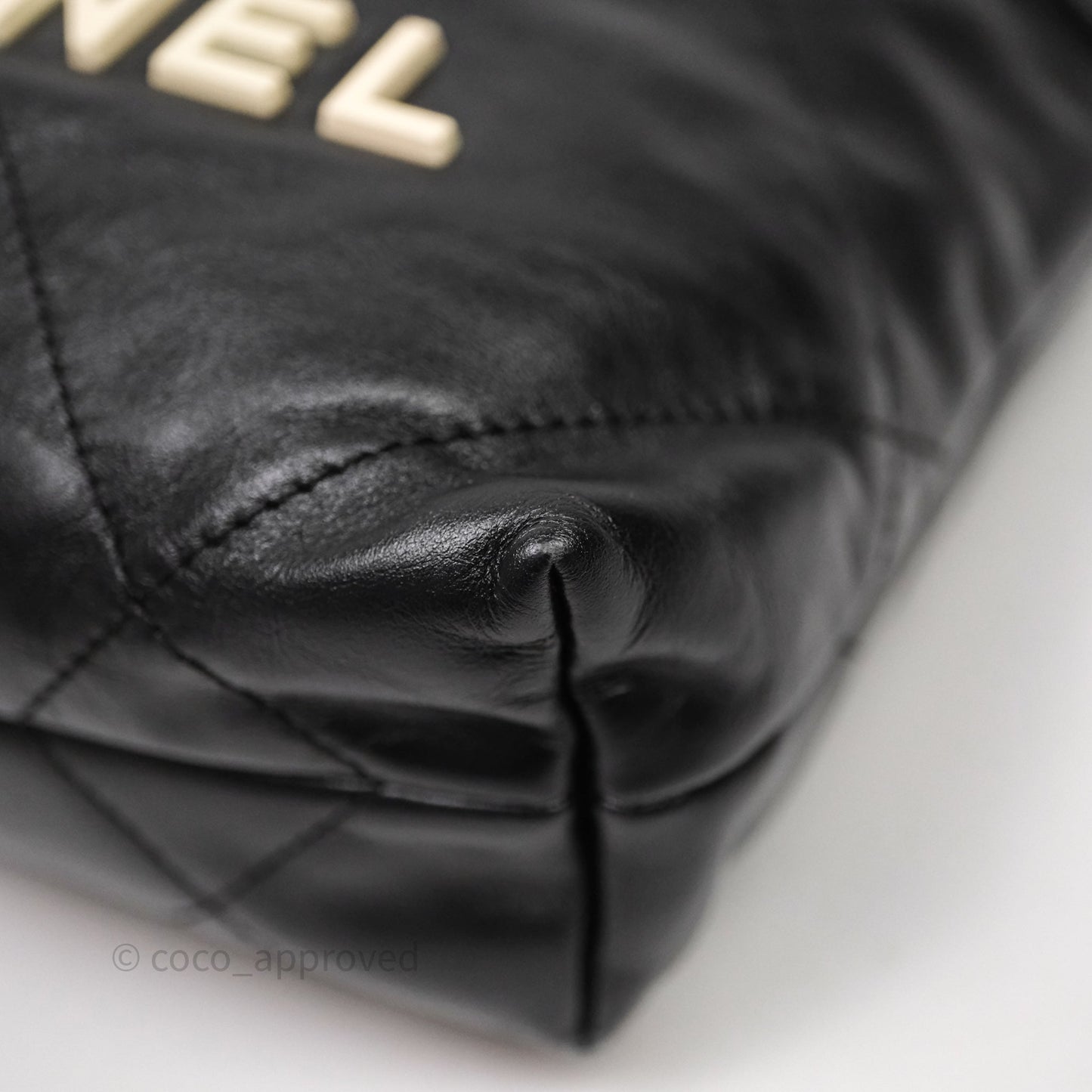 Chanel 22 Mini Bag Black Crumpled Calfskin White Lacquered Metal Logo