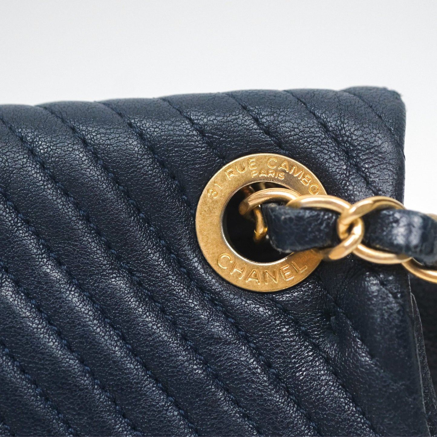 Chanel Small Chevron Surpique Flap Navy Calfskin Aged Gold Hardware