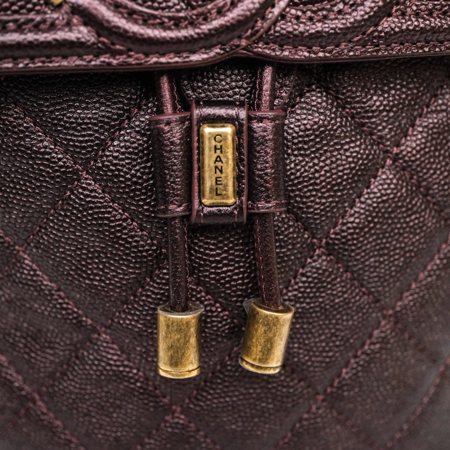 Chanel Quilted Filigree Backpack Iridescent Burgundy Caviar Aged Gold Hardware