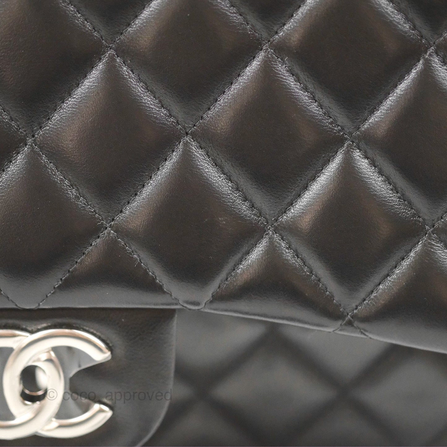Chanel Quilted Maxi Double Flap Black Lambskin Silver Hardware