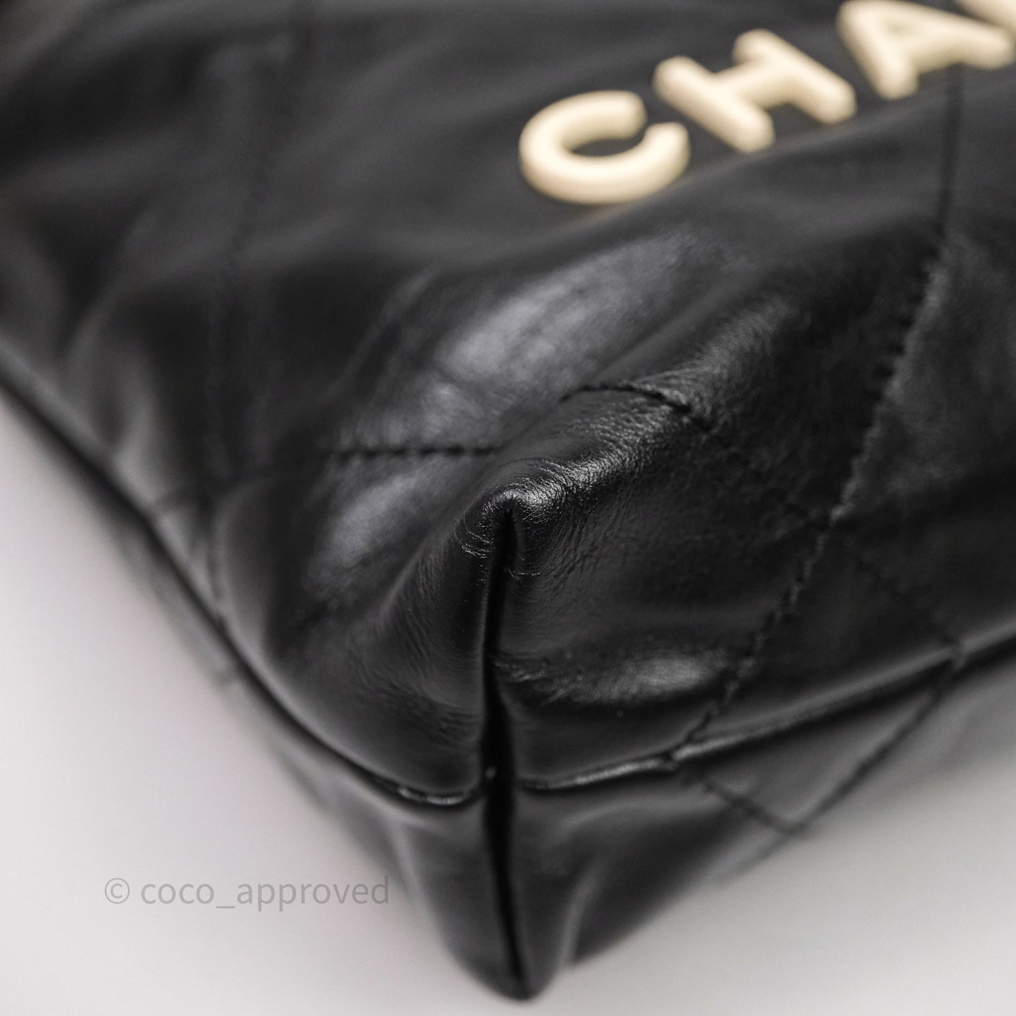 Chanel 22 Mini Bag Black Crumpled Calfskin White Lacquered Metal Logo