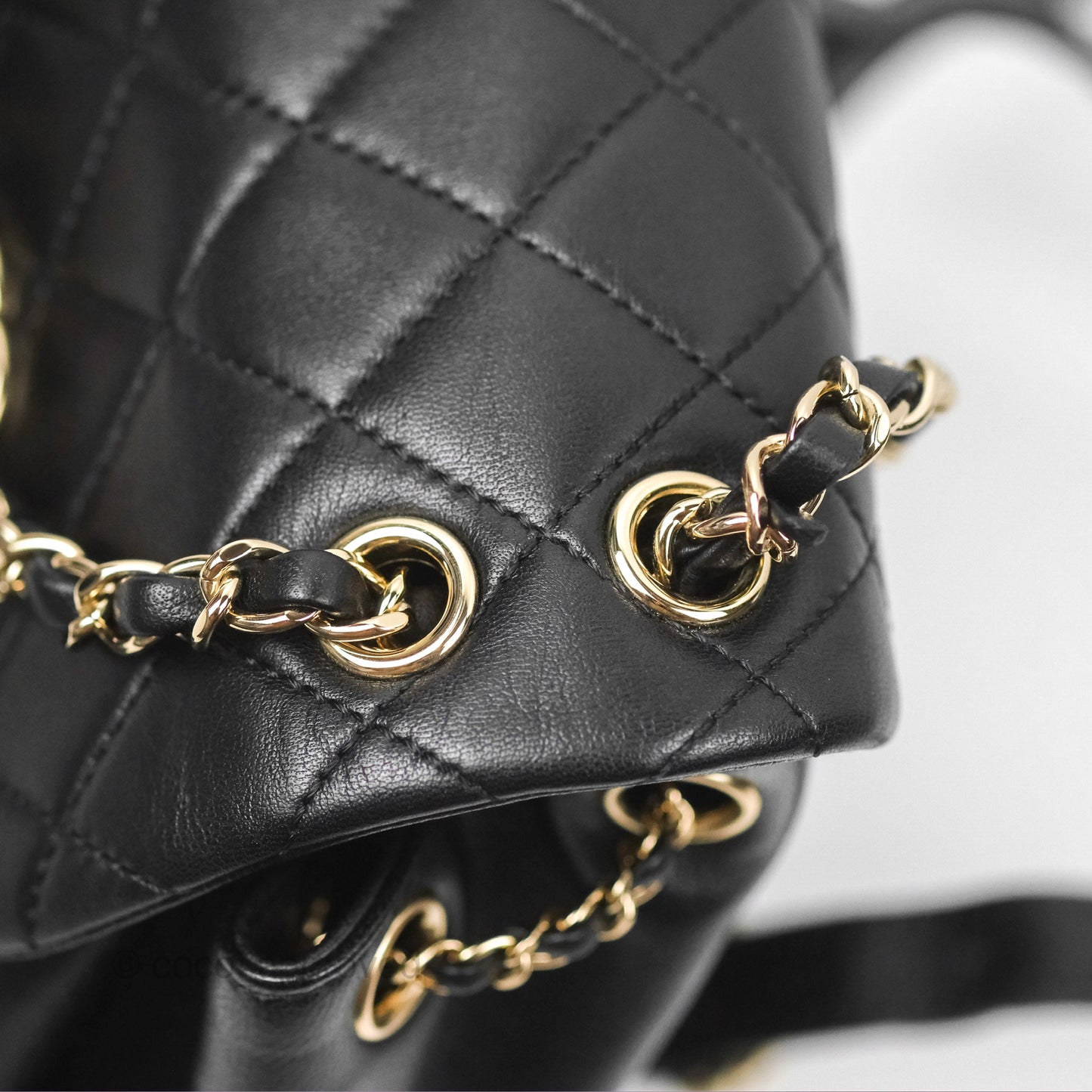 Chanel Quilted Small Duma Drawstring Backpack Black Lambskin Gold Hardware