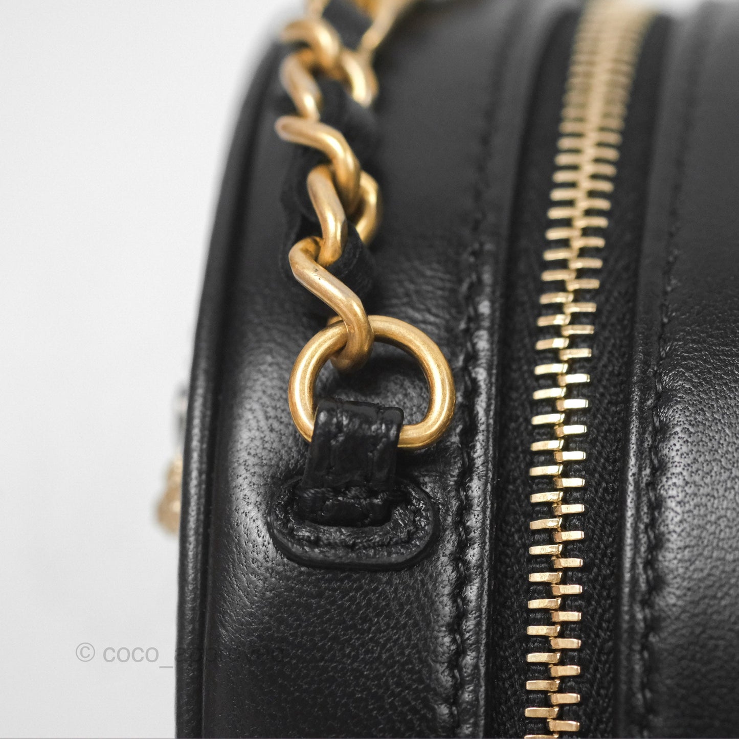 Chanel Studded CC Round Clutch With Chain Black Lambskin Gold Hardware
