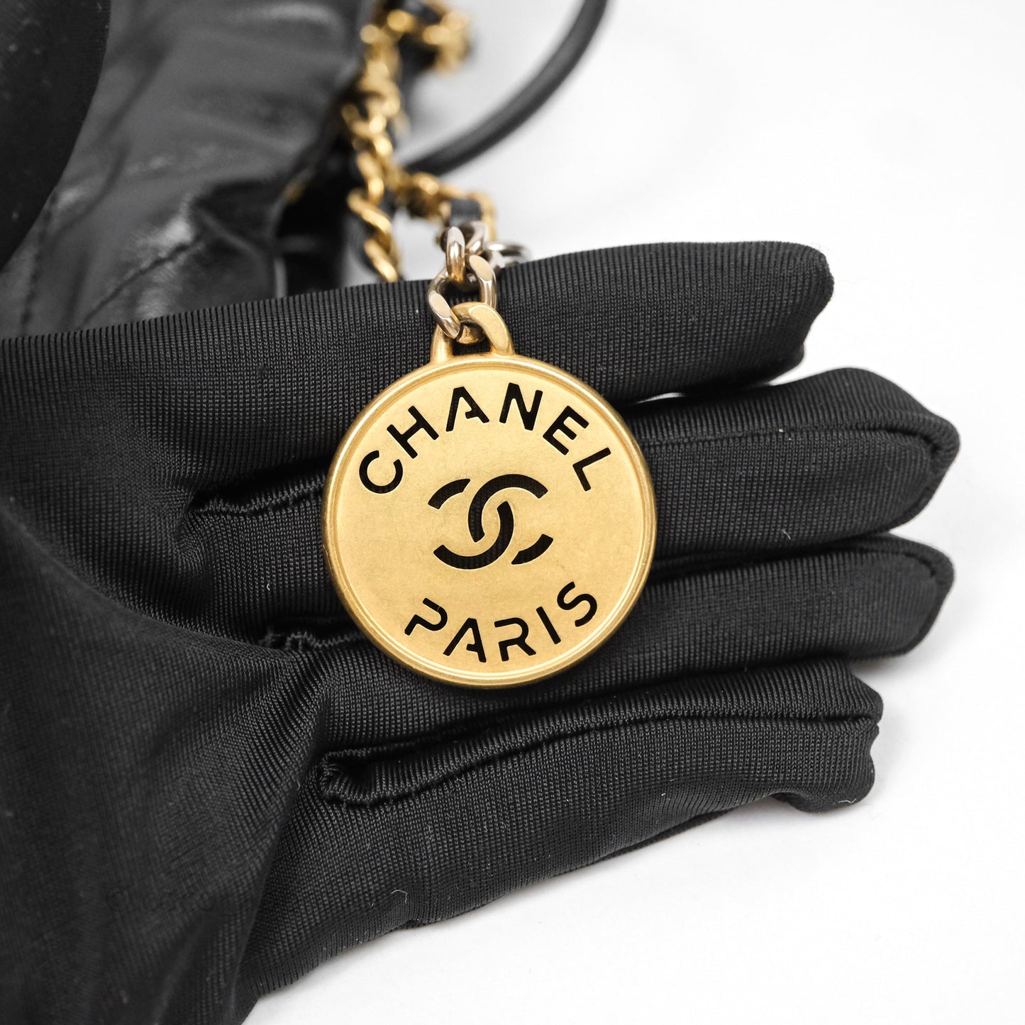 Chanel 22 Mini Bag Black Crumpled Calfskin White Lacquered Metal Logo