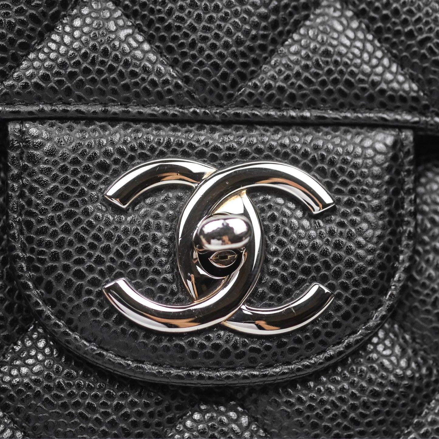Chanel Quilted Maxi Double Flap Black Caviar Silver Hardware