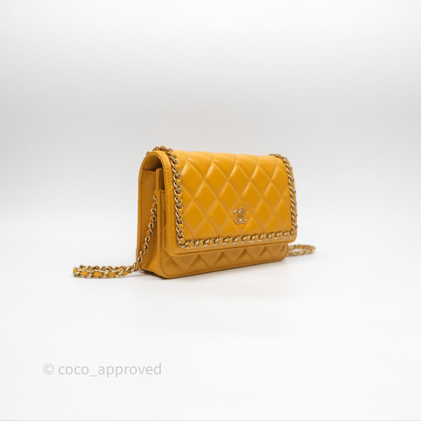 Chanel Quilted Classic Chain Around WOC Yellow Lambskin Aged Gold Hardware