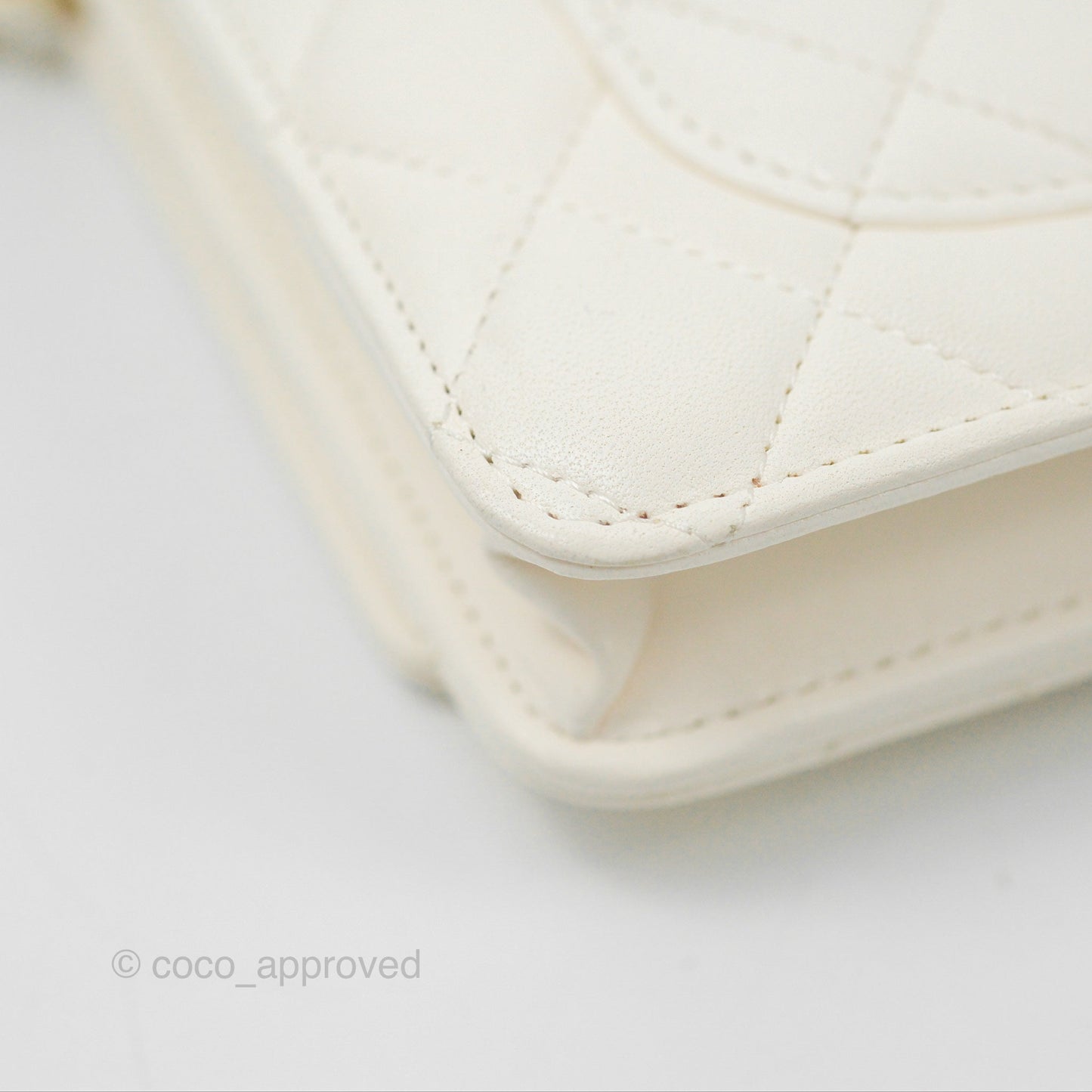 Chanel Quilted WOC White Lambskin Gold Hardware With Charms