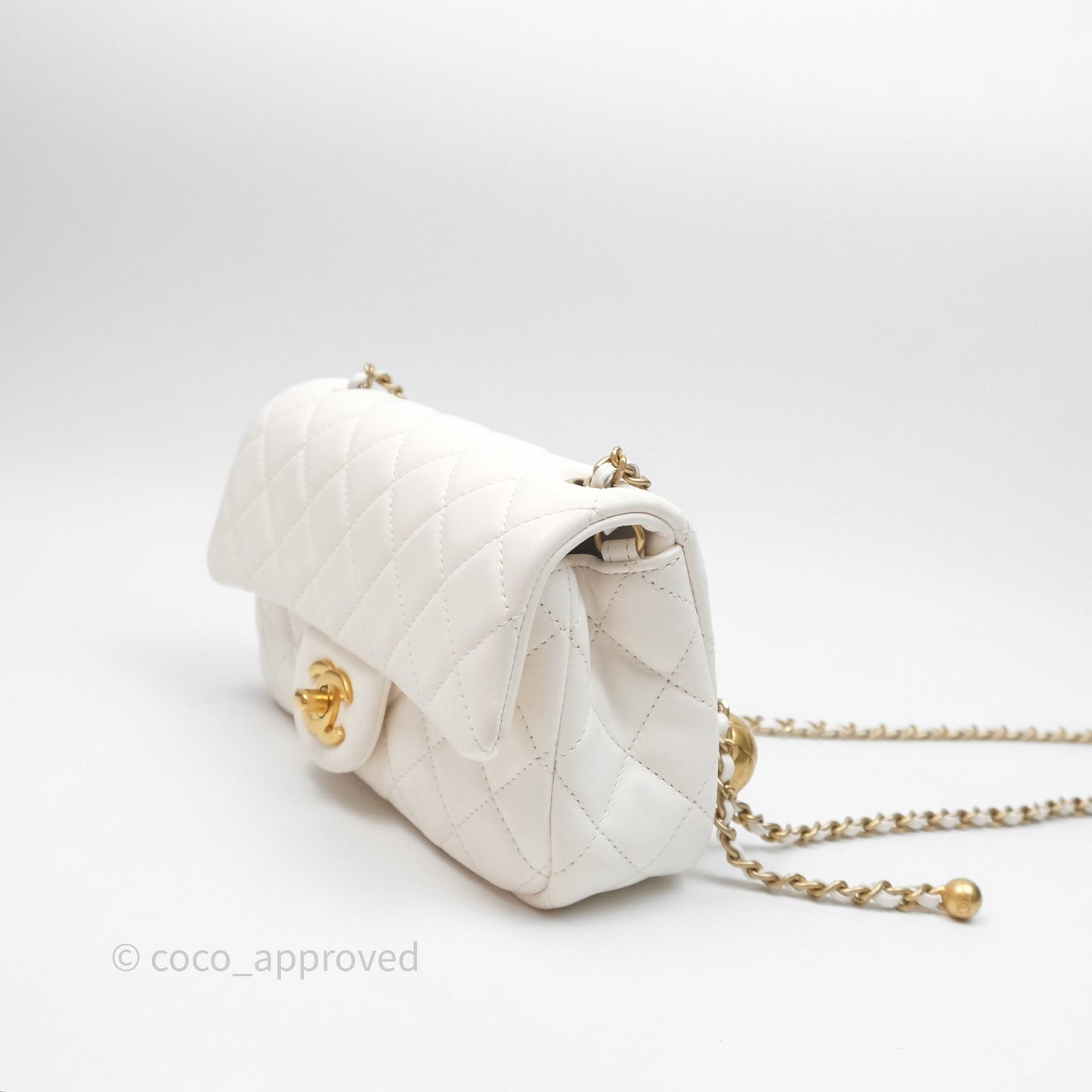 Chanel Mini Rectangular Pearl Crush Quilted White Lambskin Aged Gold Hardware