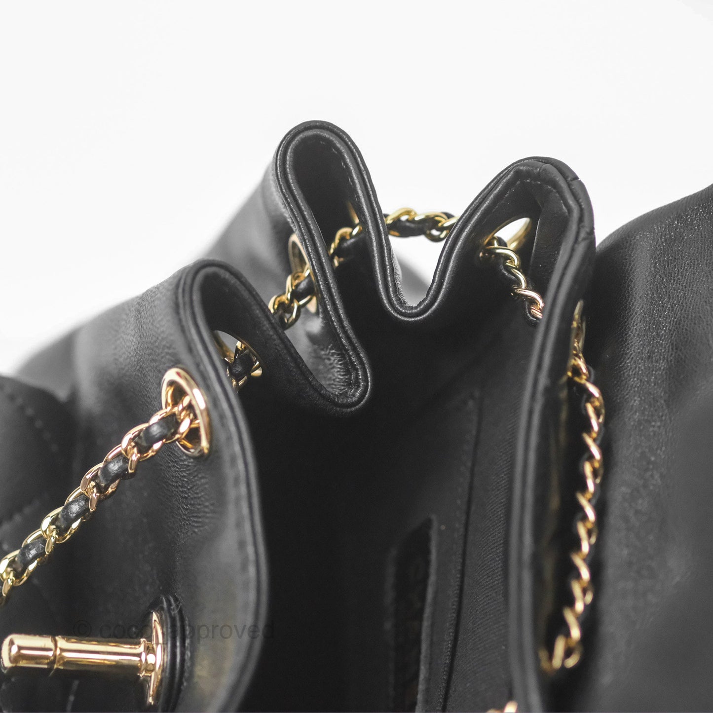 Chanel Quilted Small Duma Drawstring Backpack Black Lambskin Gold Hardware