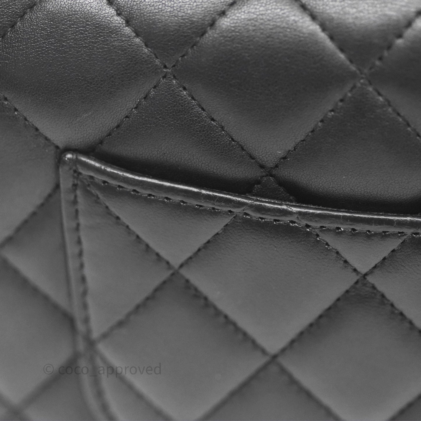 Chanel Quilted WOC Black Lambskin Silver Hardware