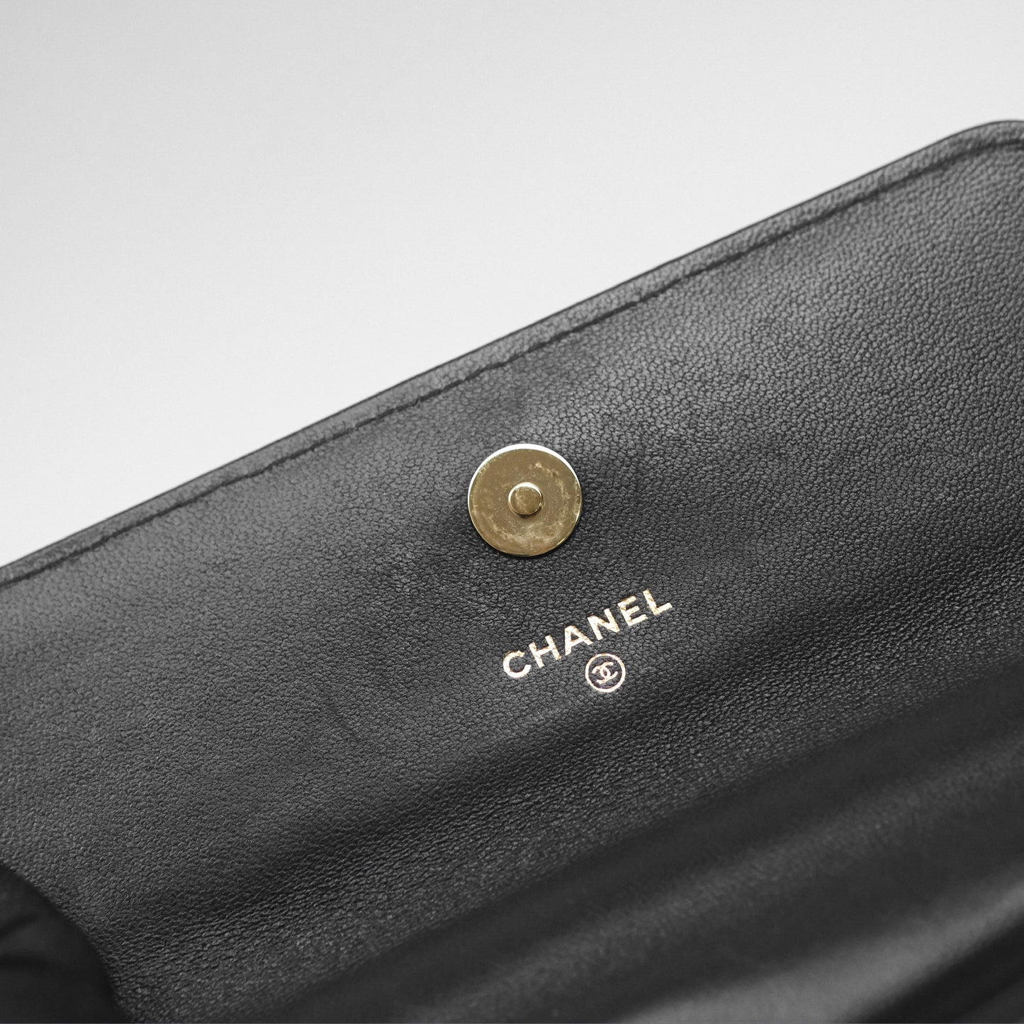 Chanel Camellia Handle Mini WOC Phone Holder with Chain Black Lambskin 23K
