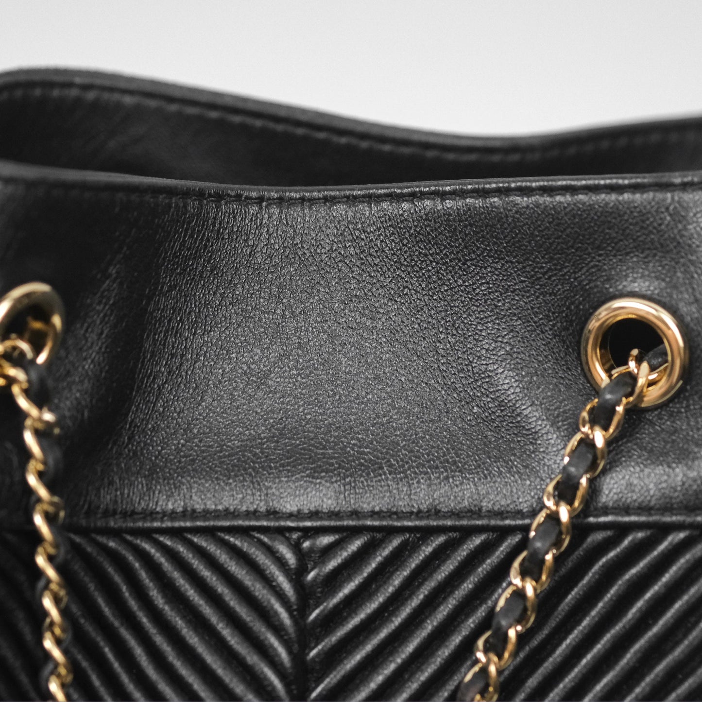 Chanel CC Chain Drawstring Bucket Bag Chevron Black Lambskin Gold Hardware