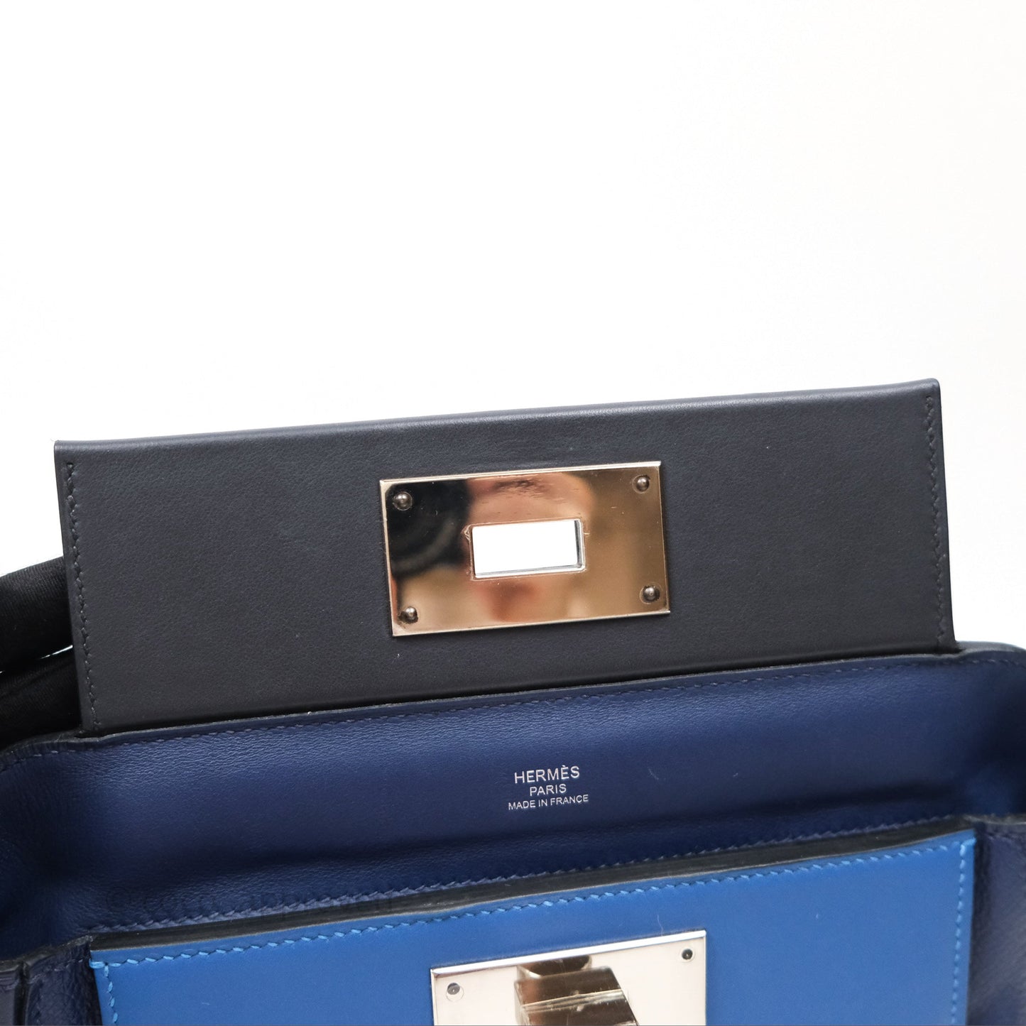 Hermès 24/24 21 Mini Bleu Saphir 73/ Bleu Indigo 76/ Bleu France 71 Evercolor/ Swift Palladium Hardware
