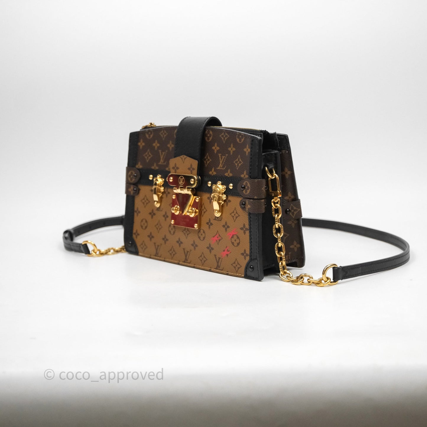 Louis Vuitton Monogram Reverse Trunk Clutch Bag