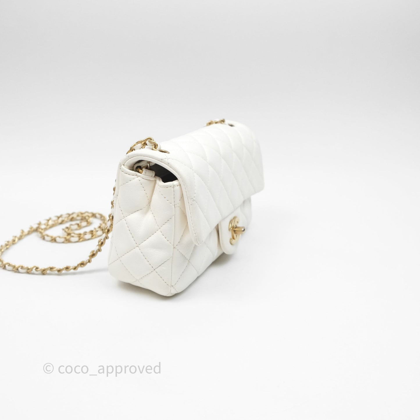 Chanel Mini Rectangular Pearl Crush Quilted White Lambskin Aged Gold Hardware