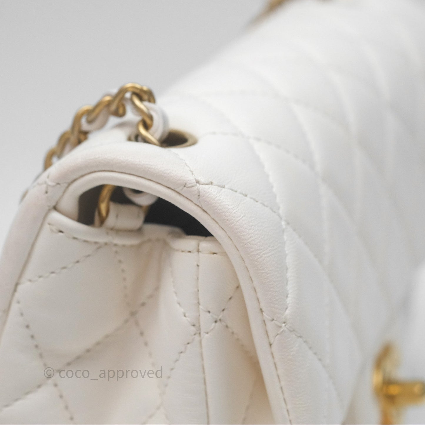 Chanel Mini Rectangular Pearl Crush Quilted White Lambskin Aged Gold Hardware