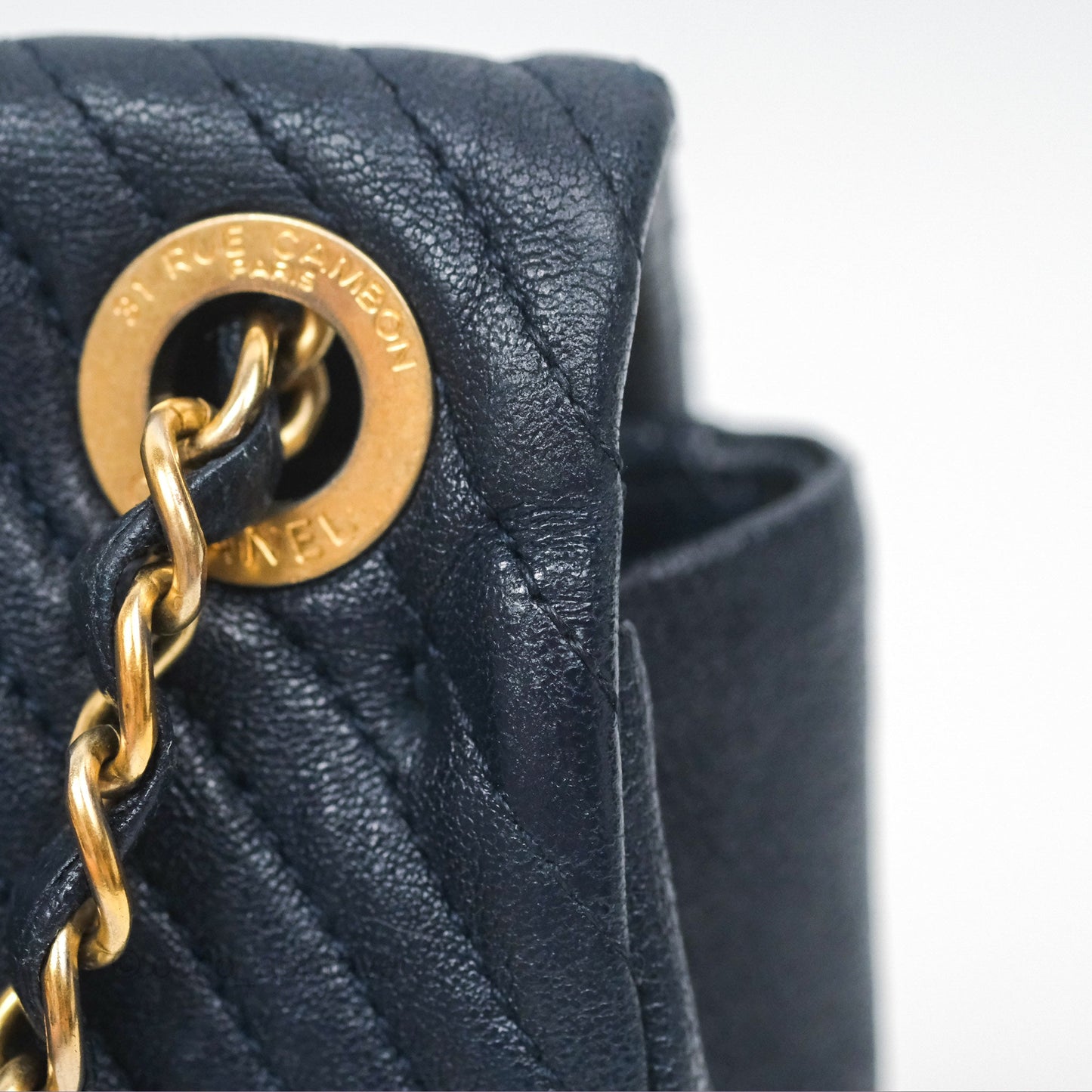 Chanel Small Chevron Surpique Flap Navy Calfskin Aged Gold Hardware