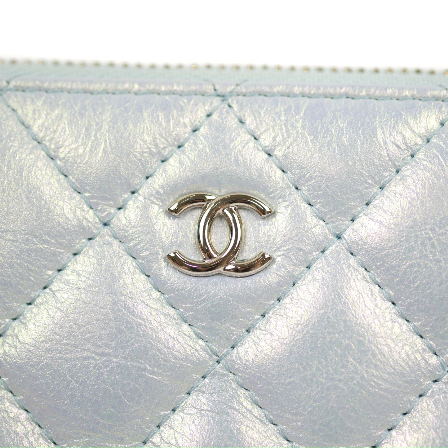 Chanel Quilted Mini O Case Iridescent Icy Blue Calfskin Silver Hardware