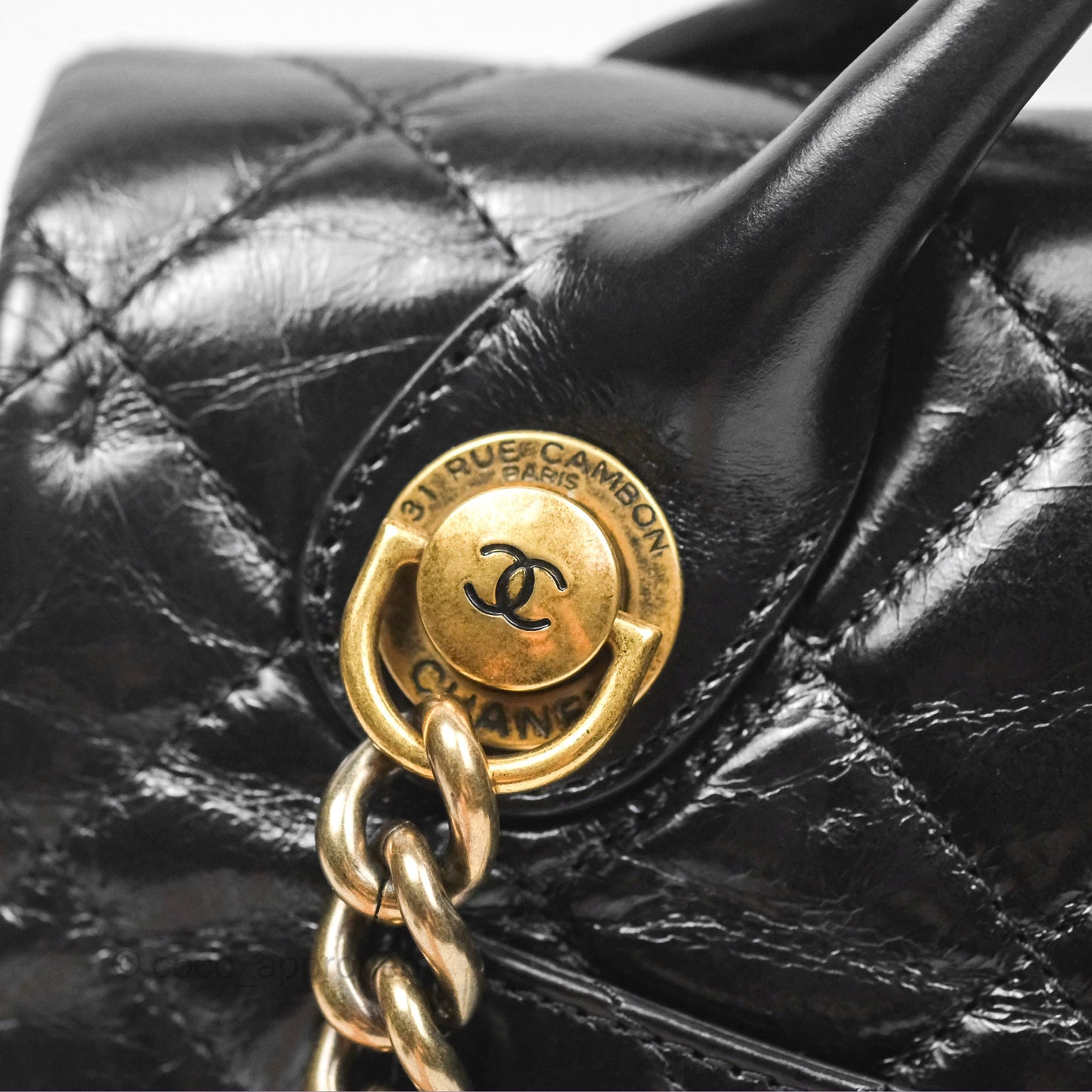 Chanel Medium Castle Rock Flap Black Glazed Calfskin Antique Gold Hardware
