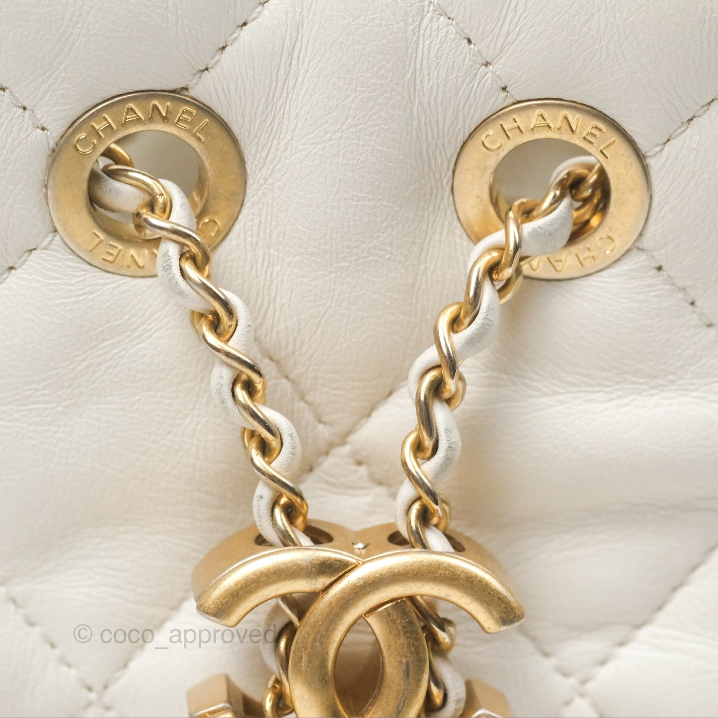 Chanel Quilted Drawstring Bucket Bag Ivory Lambskin Aged Gold Hardware